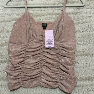 Blush/Pink top or camisole 
Lined 
Adjustable straps 
Large